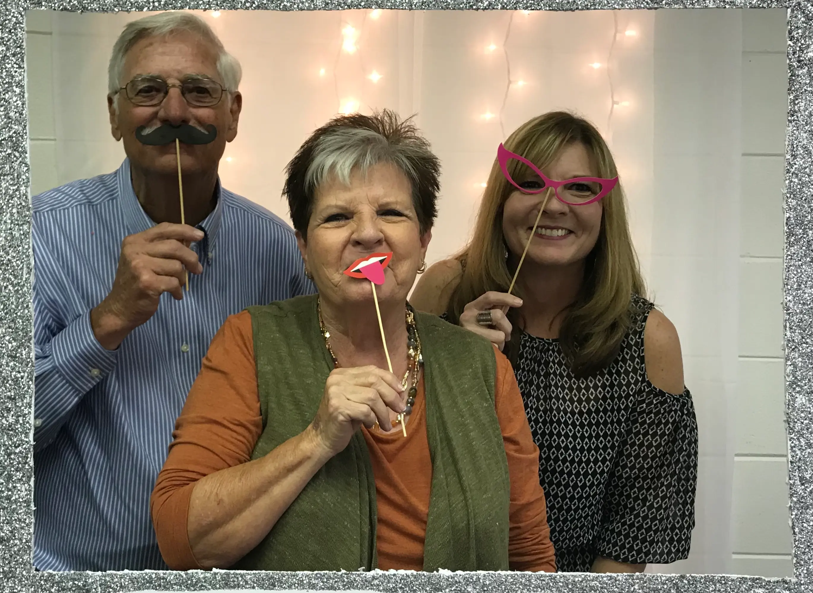 Deneen taking goofy picture with two clients